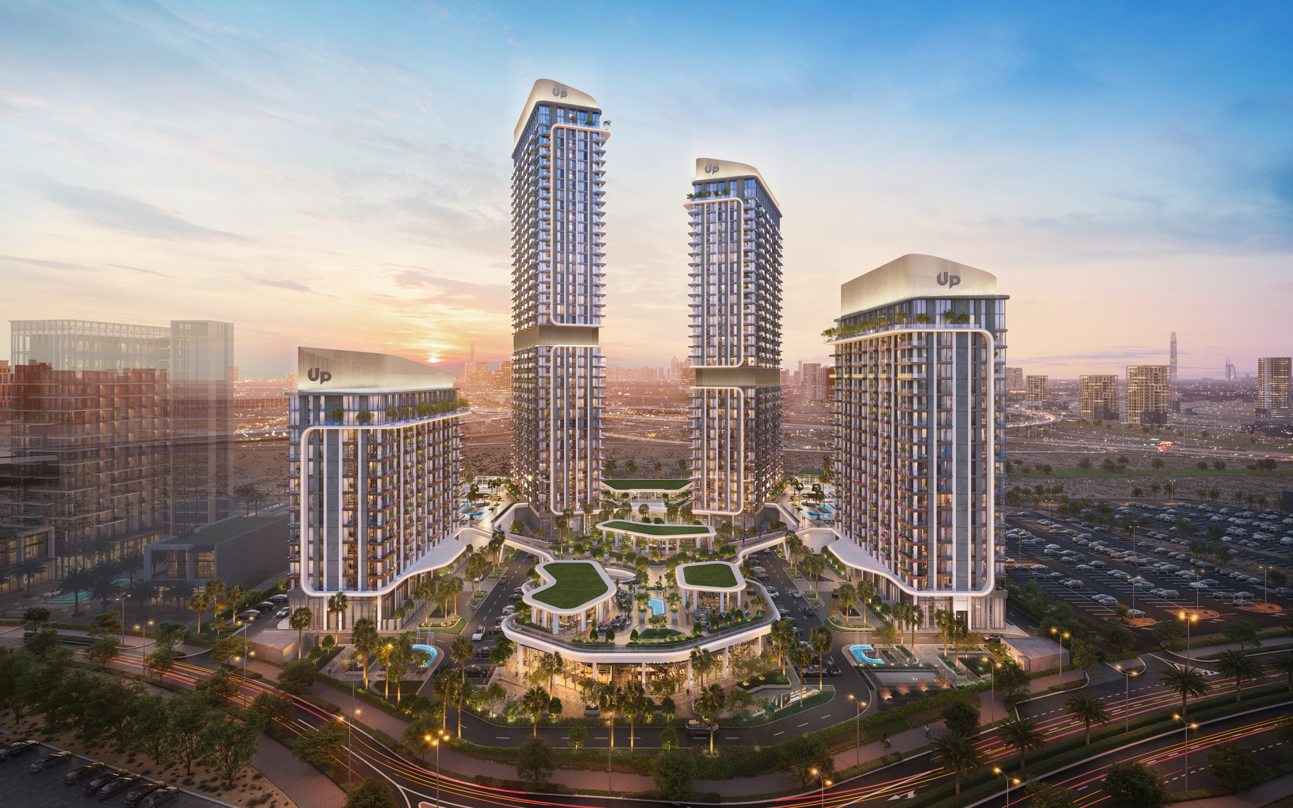 Mirdad residential towers exterior at dusk