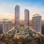 Mirdad by Union Properties towers and landscaped park at dusk
