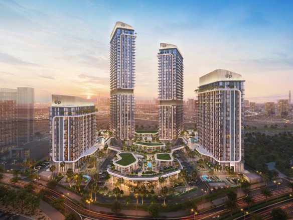 Mirdad by Union Properties towers and landscaped park at dusk